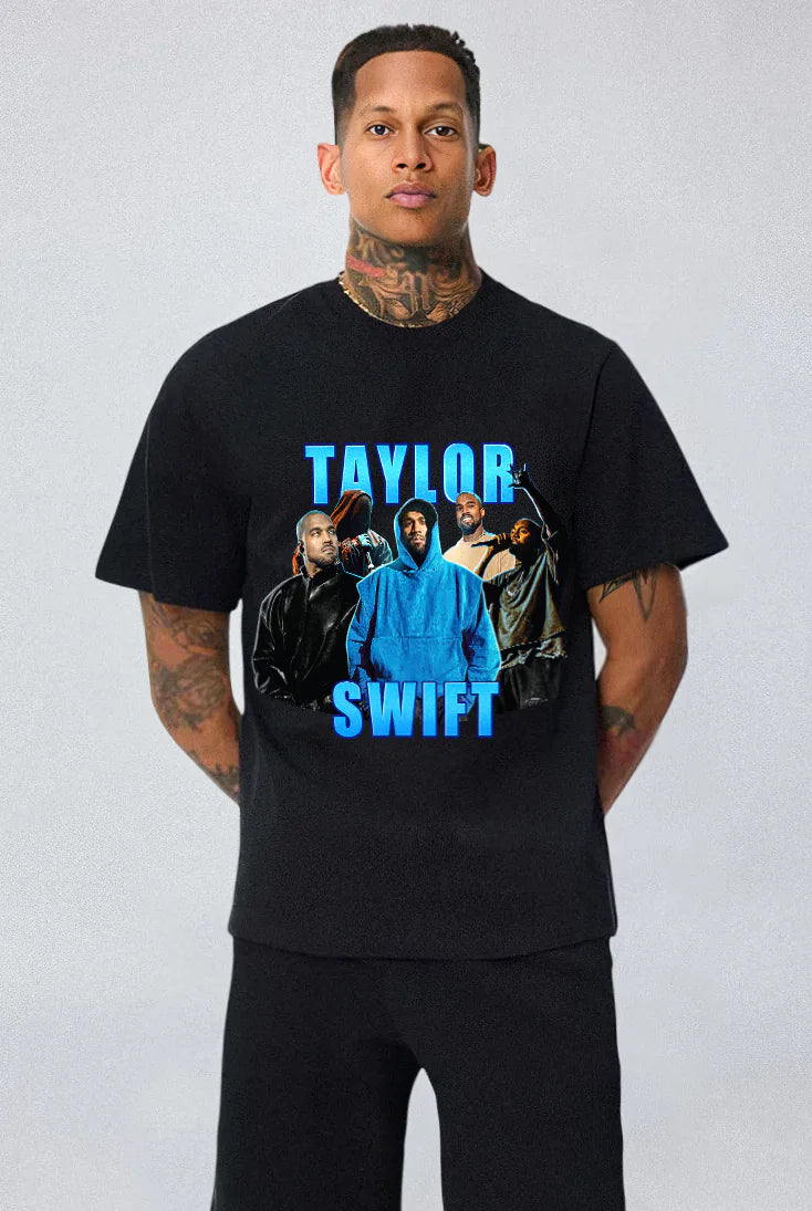 Person wearing a black t-shirt with 'Taylor Swift' graphic design on a plain background